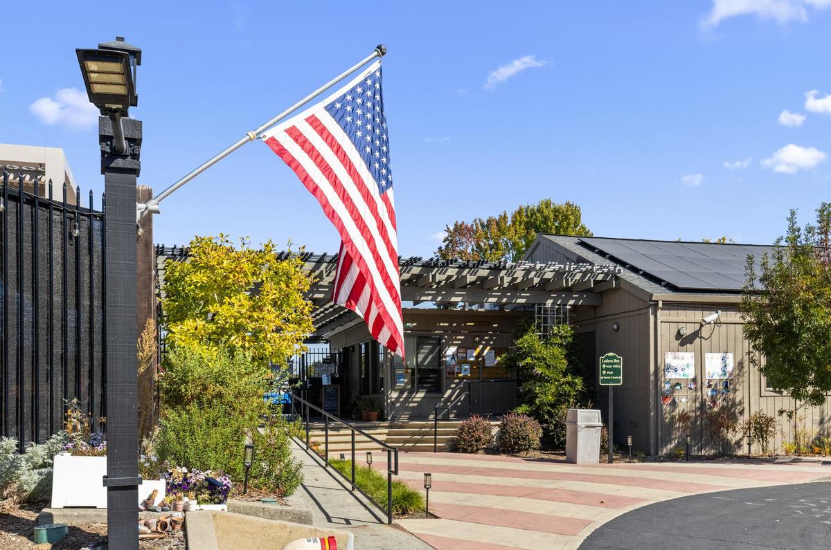 The Ladera Recreation District entrance, with a flag out front